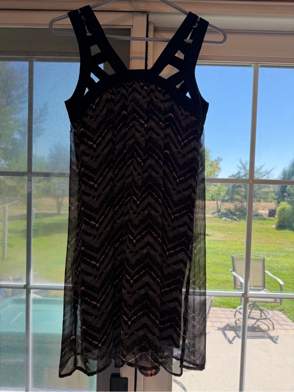 Black Sleeveless Mesh Overlay Dress with Chevron Sequin Detail. Bin 76.